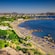 An aerial view of loungers and umbrellas on a beach at Faliraki in Rhodes